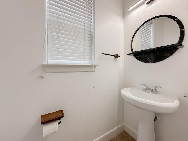 bathroom with baseboards