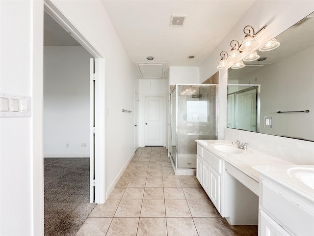 full bathroom featuring double vanity, visible vents, a shower stall, and a sink