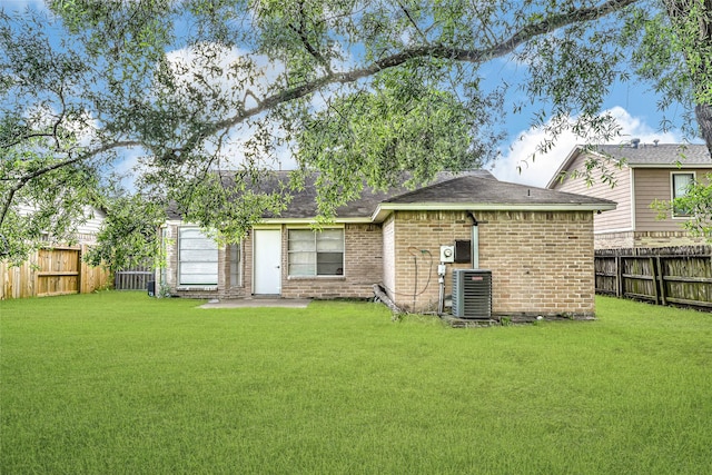 8639 Pearl Point St, Houston, TX 77044 - rear view of property featuring a fenced backyard and brick siding