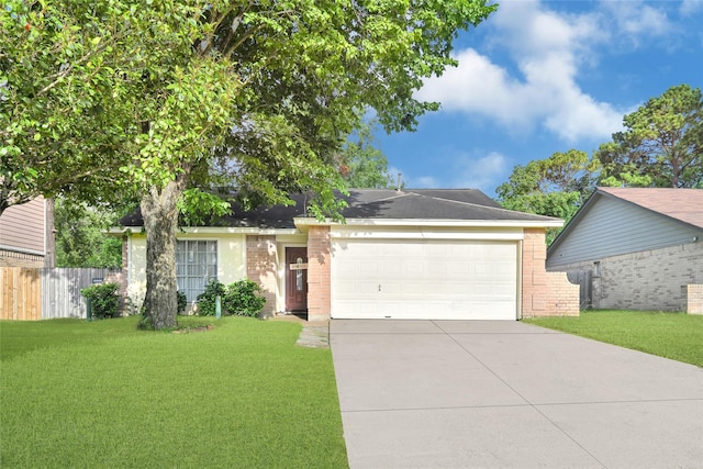 8639 Pearl Point St, Houston, TX 77044 - ranch-style house featuring brick siding, driveway, and an attached garage