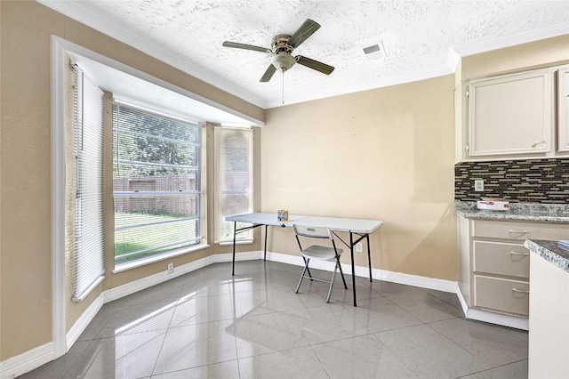 8639 Pearl Point St, Houston, TX 77044 - dining space with crown molding and a ceiling fan