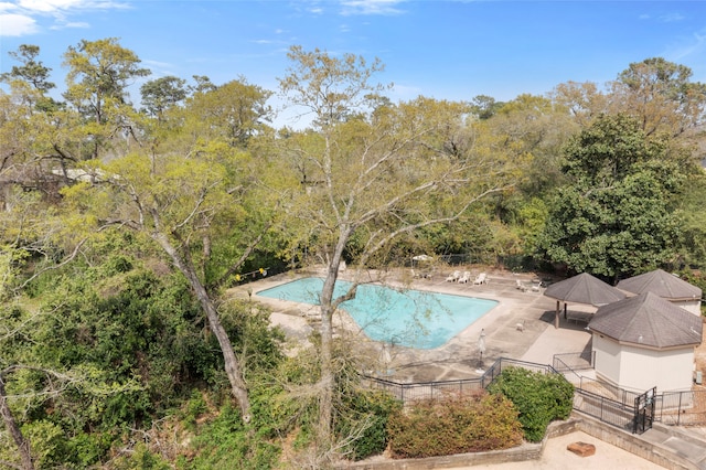 148 Sugarberry Cir, Houston, TX 77024 - community pool featuring a patio and fence