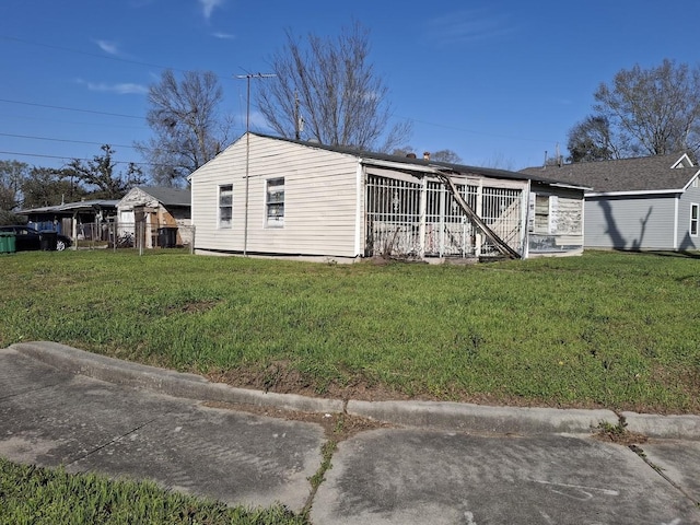 exterior space with a front lawn