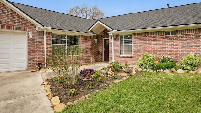 view of front of home with brick siding, a shingled roof, and a garage