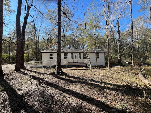 view of front of house with a deck