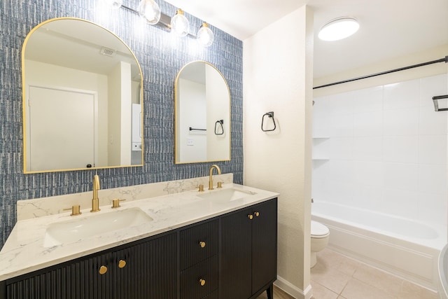 full bathroom with a sink, visible vents, toilet, and tile patterned floors