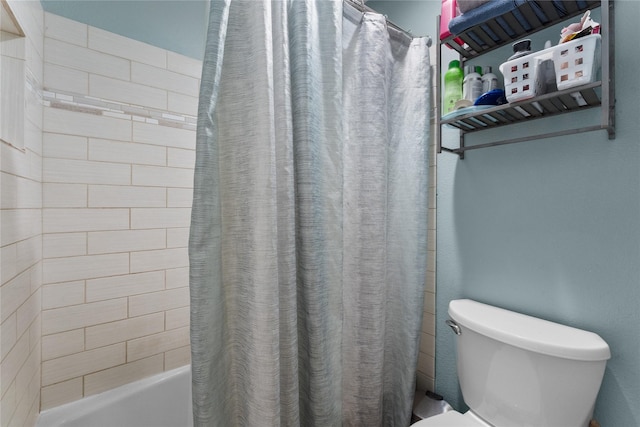 bathroom with toilet and shower / bath combo