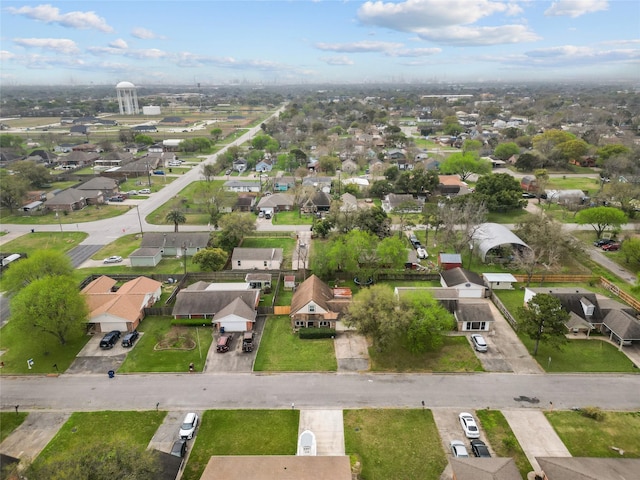 birds eye view of property with a residential view