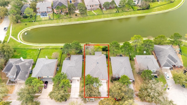 birds eye view of property with a residential view and a water view