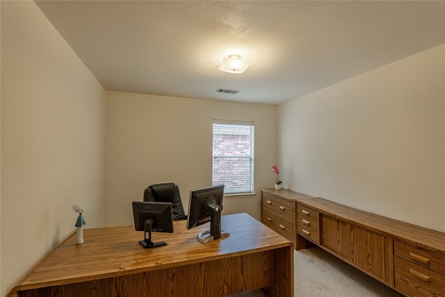 office space featuring light colored carpet and visible vents