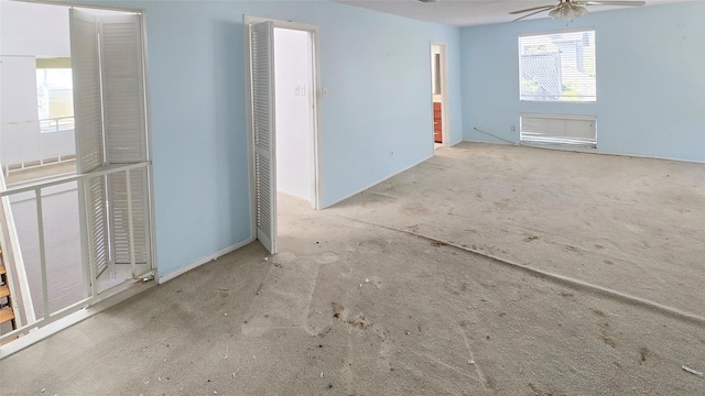 empty room featuring ceiling fan