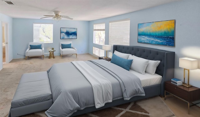 carpeted bedroom featuring visible vents and ceiling fan