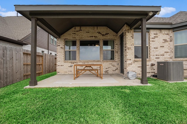 view of patio / terrace featuring fence and central AC