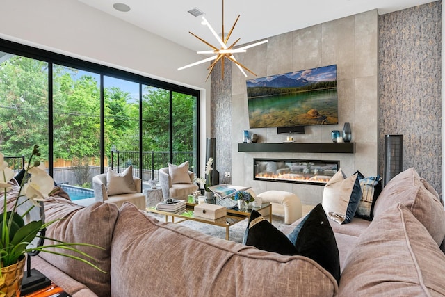 living area with visible vents and a fireplace