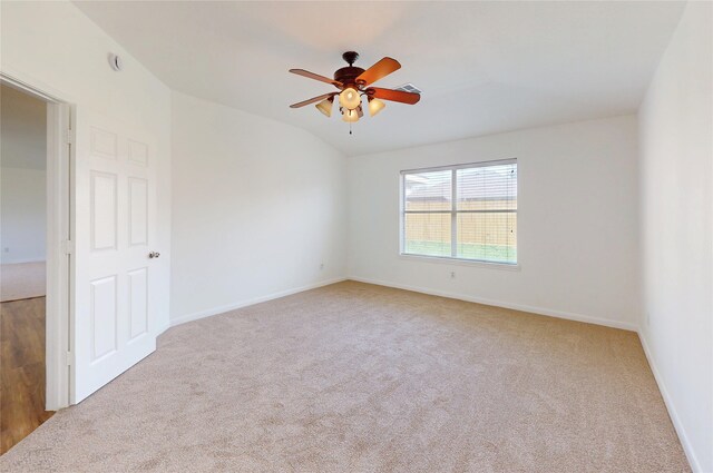 unfurnished room featuring baseboards, ceiling fan, and carpet floors