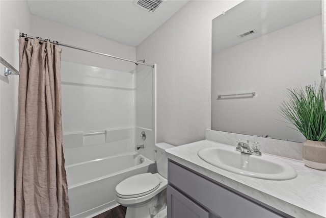 bathroom featuring visible vents, toilet, vanity, and shower / bath combination with curtain