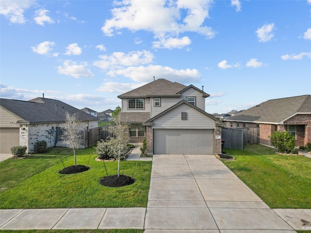 traditional-style house with brick siding, concrete driveway, and a front lawn