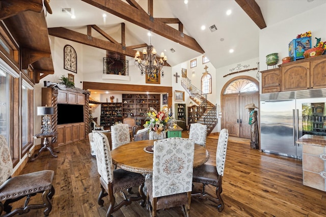 dining area featuring an inviting chandelier, stairs, visible vents, beamed ceiling, and wood-type flooring