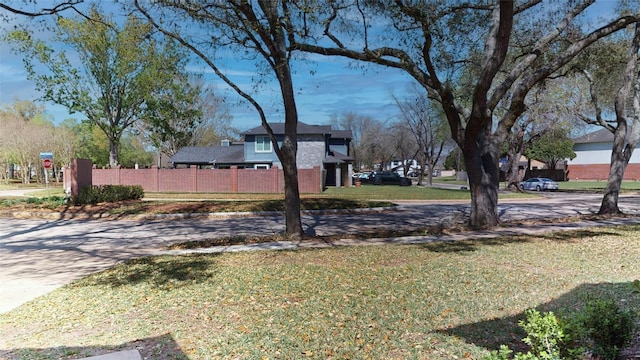 view of yard with fence