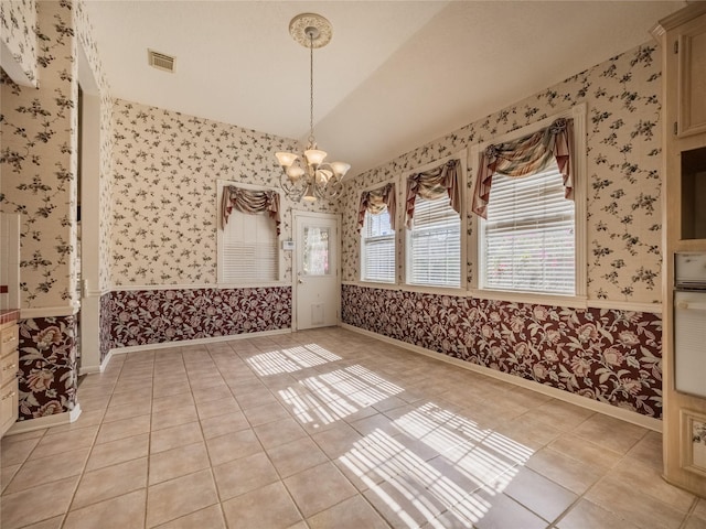 2402 Duhon Pl, Seabrook, TX 77586 - unfurnished dining area featuring wallpapered walls, a chandelier, light tile patterned flooring, vaulted ceiling, and baseboards