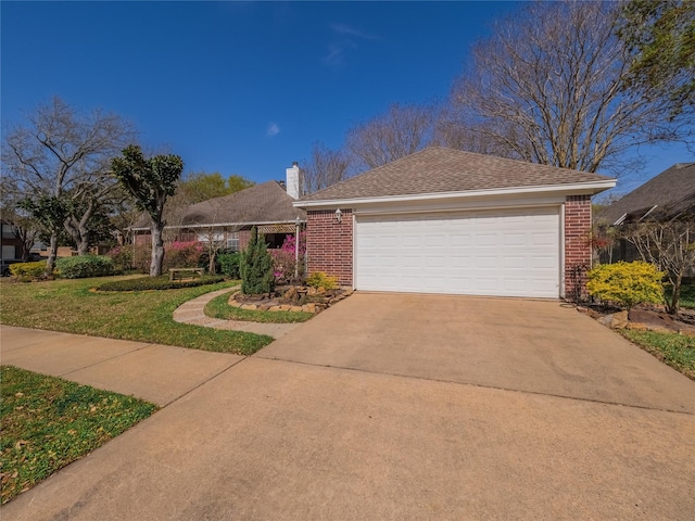 single story home with a chimney, driveway, a front lawn, and brick siding