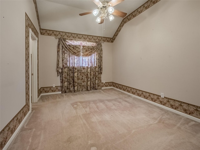 2402 Duhon Pl, Seabrook, TX 77586 - empty room featuring carpet flooring, vaulted ceiling, baseboards, and a ceiling fan