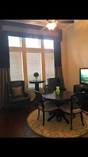 dining room with a ceiling fan