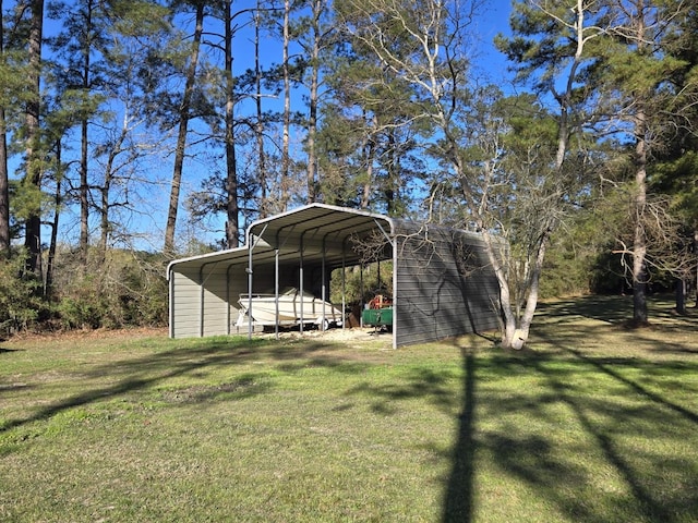 view of yard with a detached carport