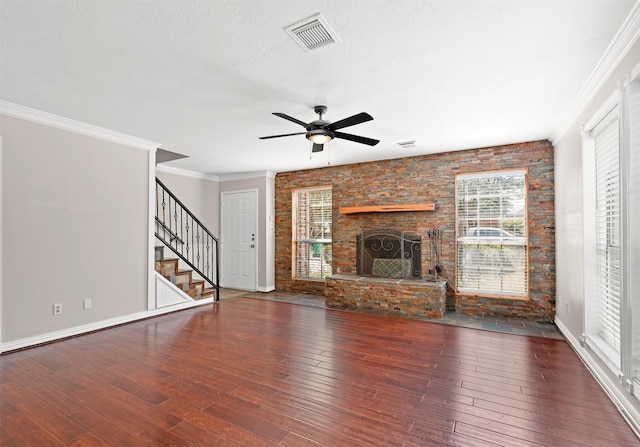 4714 Hawthorne St, Seabrook, TX 77586 - unfurnished living room featuring visible vents, ornamental molding, stairs, ceiling fan, and wood-type flooring