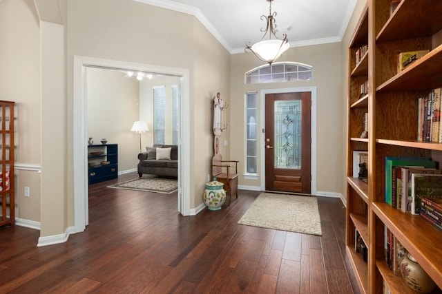 foyer entrance featuring crown molding, baseboards, and dark wood-style flooring