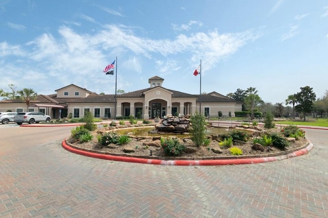 view of building exterior with fence