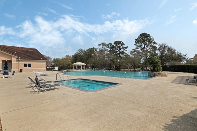 pool with a patio