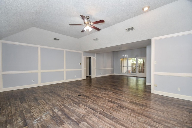 unfurnished living room featuring visible vents, a ceiling fan, lofted ceiling, and wood finished floors