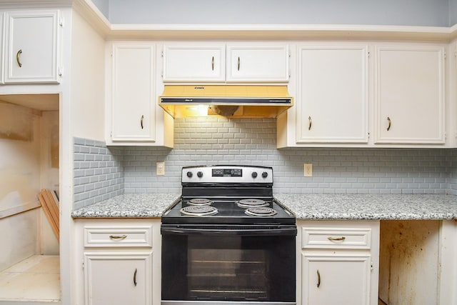 kitchen featuring under cabinet range hood, decorative backsplash, white cabinetry, and black electric range