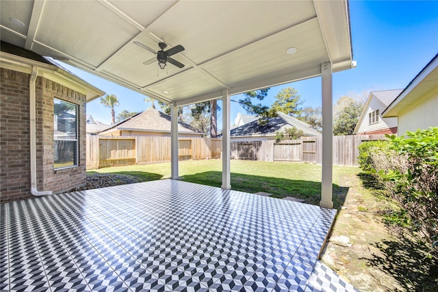 view of patio / terrace featuring a fenced backyard and a ceiling fan