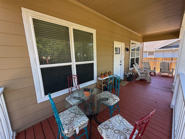 6526 Sherman St, Houston, TX 77011 - wooden deck featuring a porch and outdoor dining space