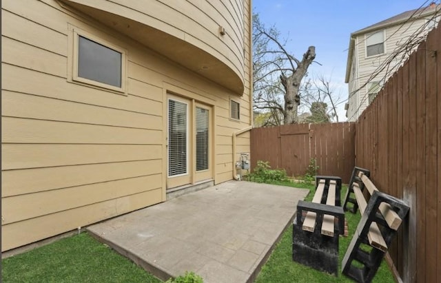 view of patio / terrace with fence