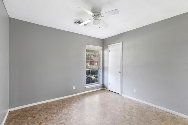 unfurnished room featuring baseboards and a ceiling fan