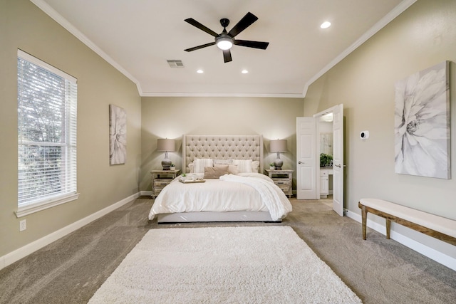 carpeted bedroom featuring crown molding, visible vents, and baseboards