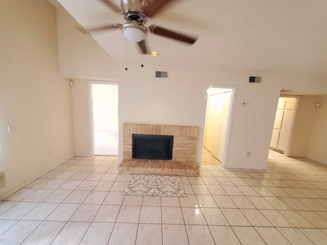 unfurnished living room featuring light tile patterned floors, a fireplace, visible vents, and ceiling fan