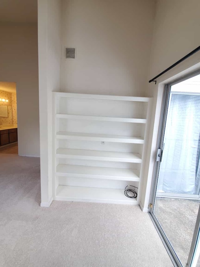 interior details with visible vents and carpet floors