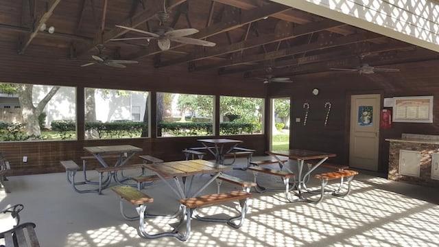 interior space featuring outdoor dining area and ceiling fan