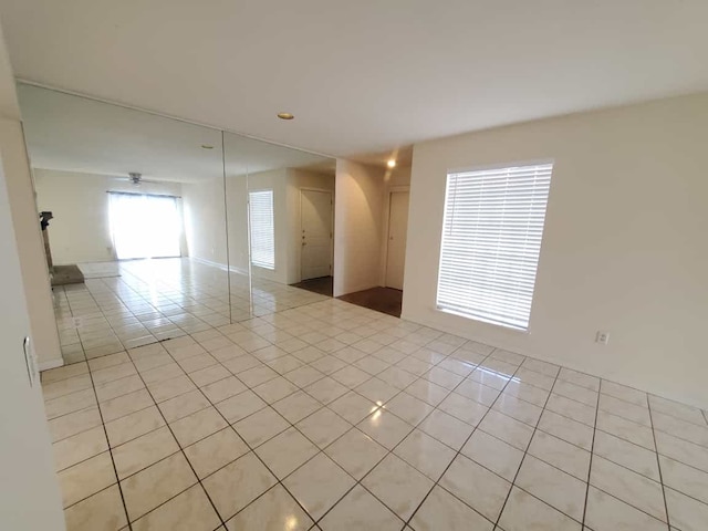 empty room featuring light tile patterned floors