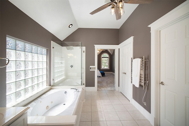 full bath with tile patterned flooring, ceiling fan, lofted ceiling, a stall shower, and a tub with jets