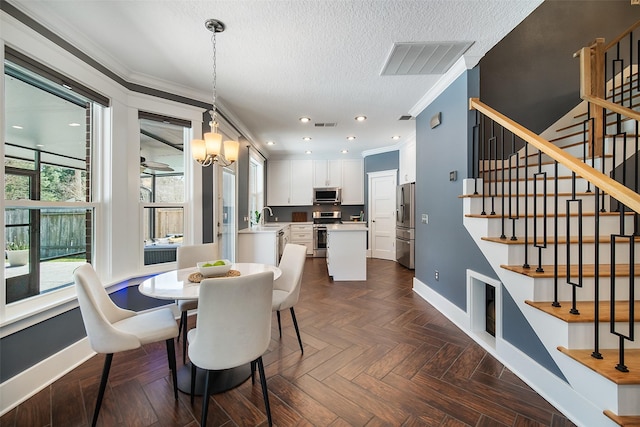 dining space featuring stairway, a textured ceiling, baseboards, and ornamental molding