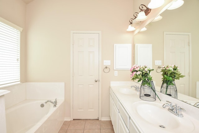 full bath featuring tile patterned flooring, double vanity, a garden tub, and a sink