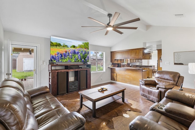 living room featuring wood finished floors, visible vents, a ceiling fan, beamed ceiling, and baseboards