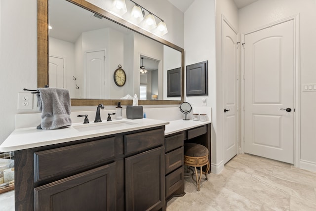 bathroom with vanity and visible vents