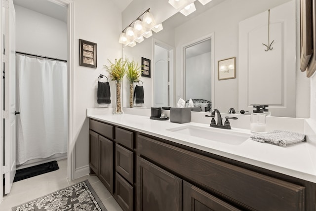 full bath with tile patterned flooring and vanity