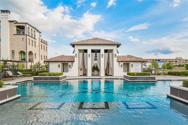 7527 Ciano Ln, Houston, TX 77055 - community pool featuring a patio area